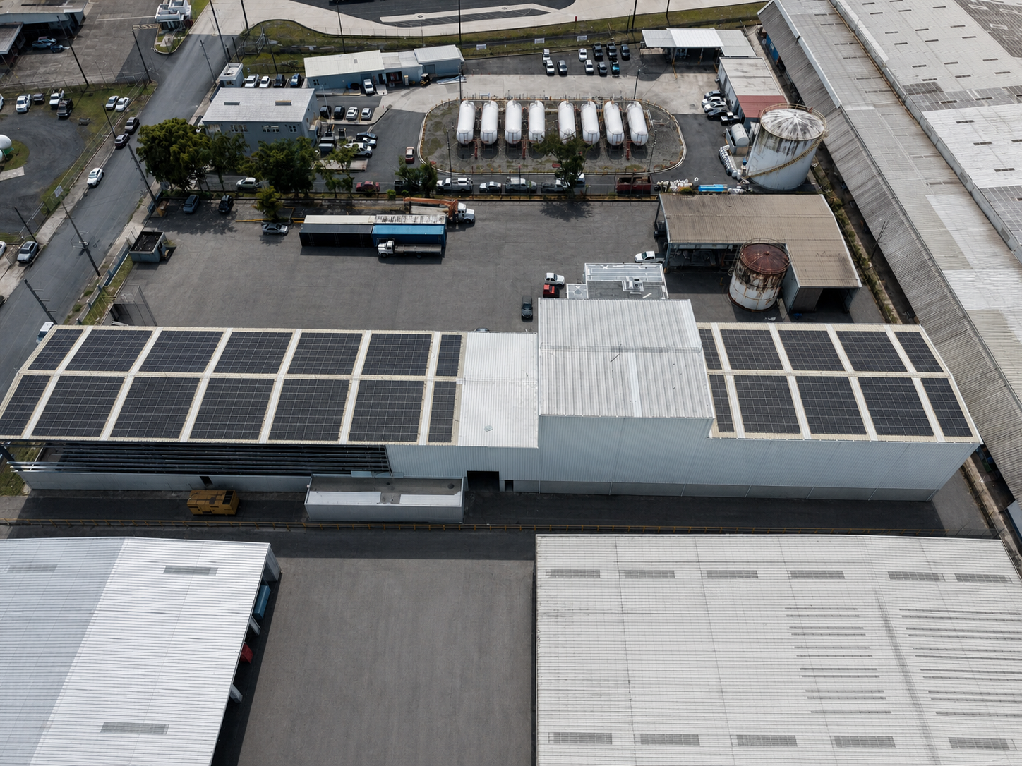 Puerto Rico industrial facility with solar panels installed across its cream roof